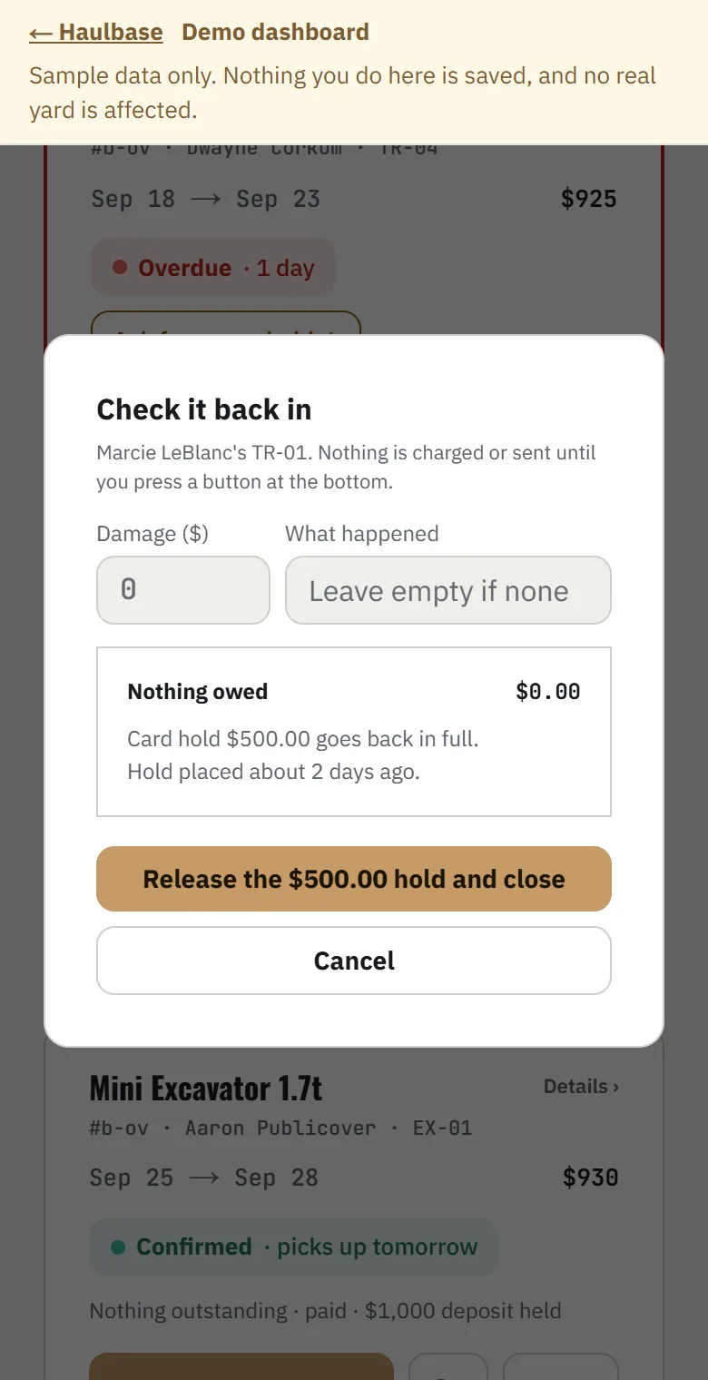 Check it back in, for a dump trailer that came back clean: nothing owed, and one button to release the $500.00 hold in full.